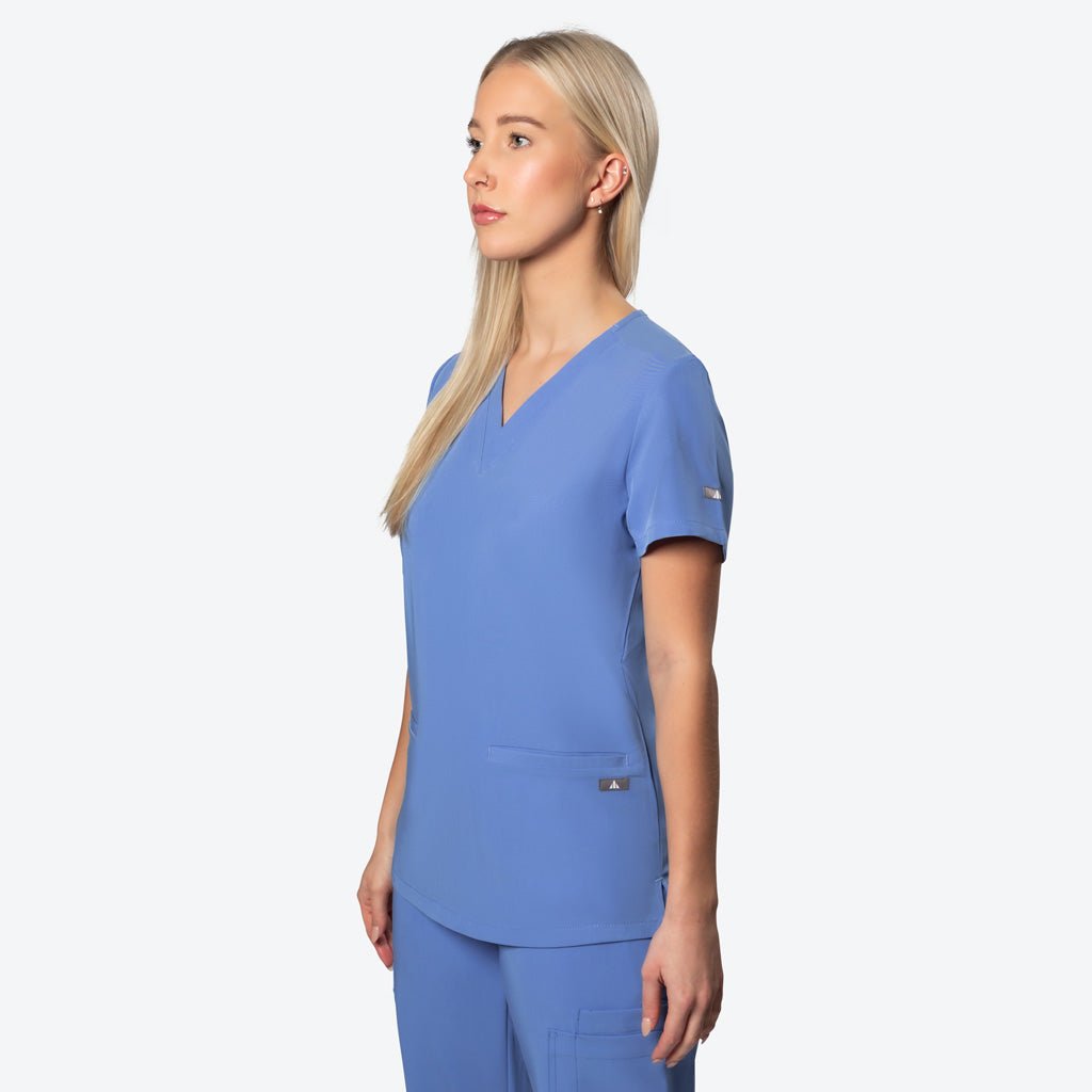 BAD WOMENS REVOLUTIONARY™ SCRUB TOP